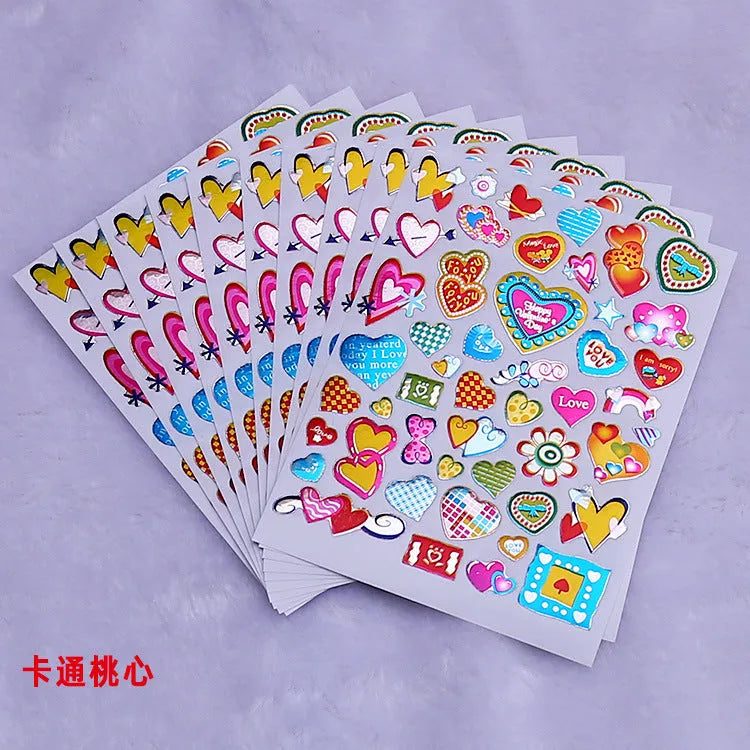 100 gold foil glitter heart reward stickers on backing sheet, approximately 20mm diameter