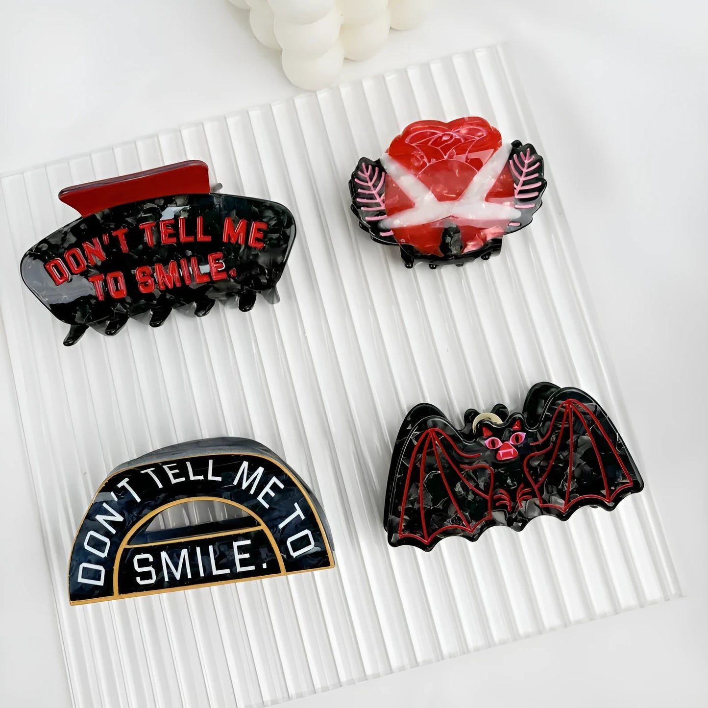 Halloween hair clip with bat design incorporating shark and vinegar elements