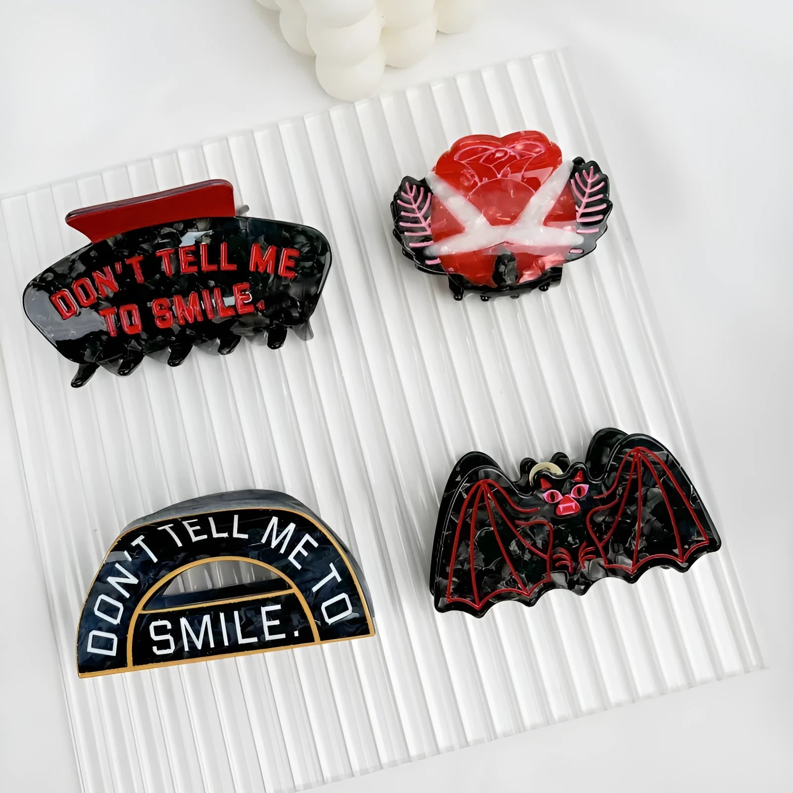 Halloween hair clip with bat design incorporating shark and vinegar elements