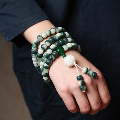 Lotus white jade Bodhi root bracelet with floating flowers pattern on 8x10mm beads