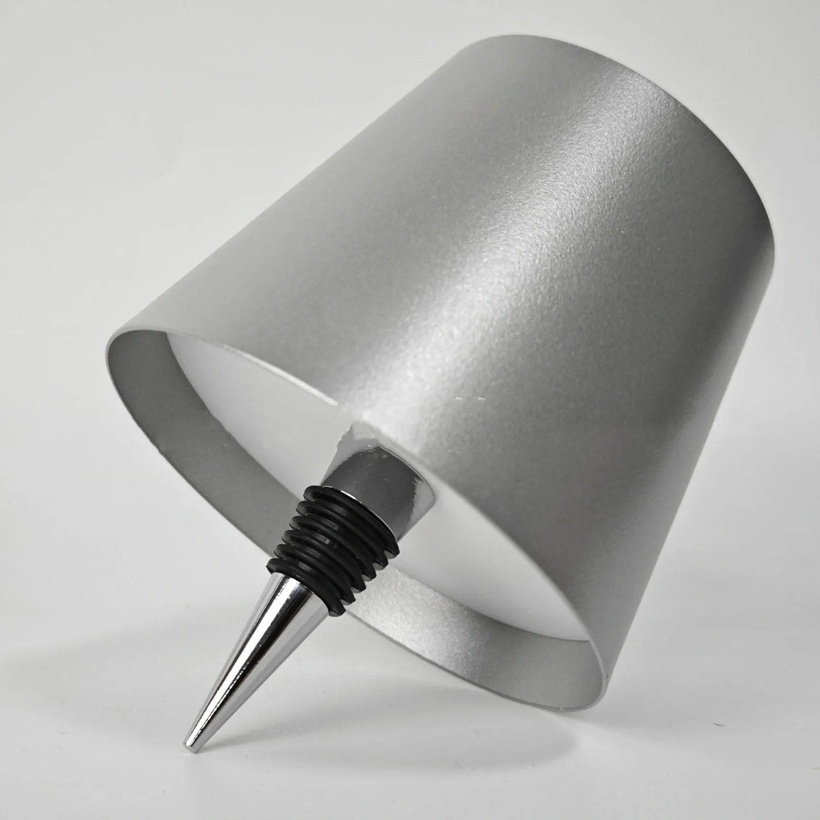 Wireless LED desk lamp in black tricolour finish, bottle-shaped with detachable base and touch control for 2000mAh powered lighting