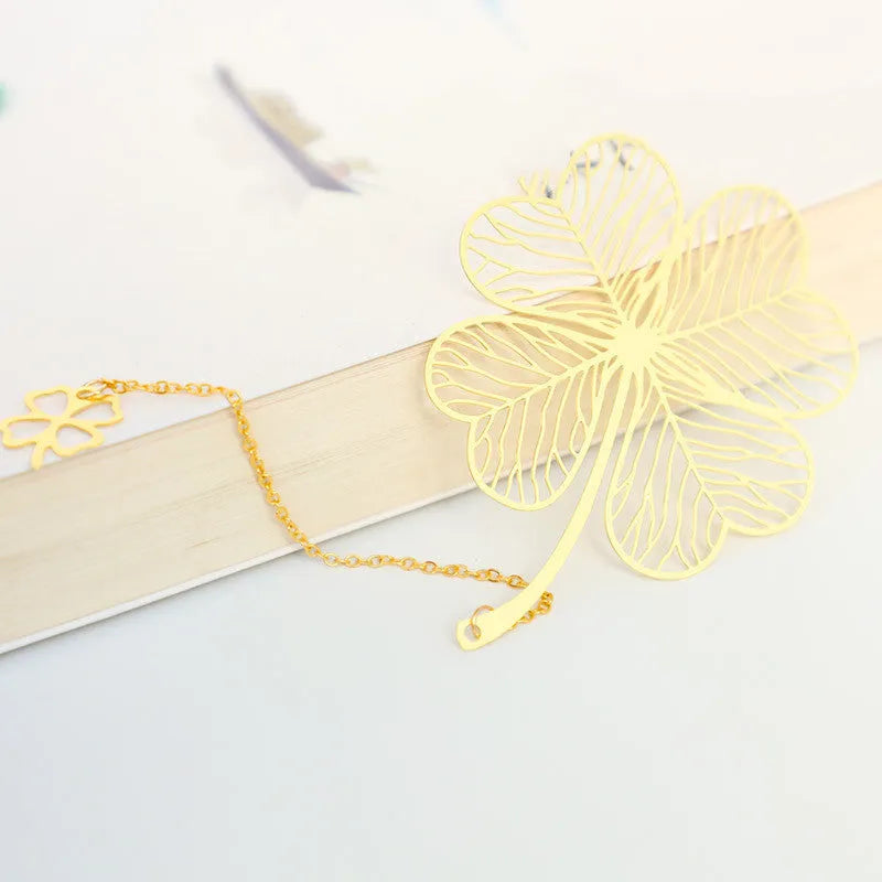 Brass metal bookmark with hollow plating leaf design and rose gold tassel decoration