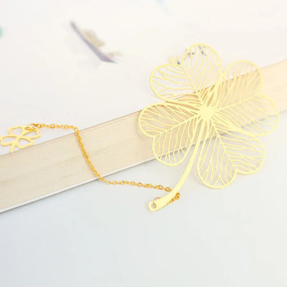 Brass metal bookmark with hollow plating leaf design and rose gold tassel decoration