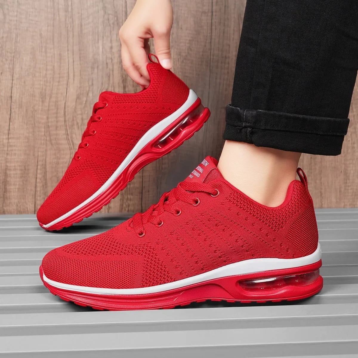 Casual Flyknit running shoes in multiple colours with mesh uppers and a round toe design.