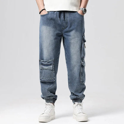 Men's high-waisted loose denim trousers with multiple pockets showing straight leg opening
