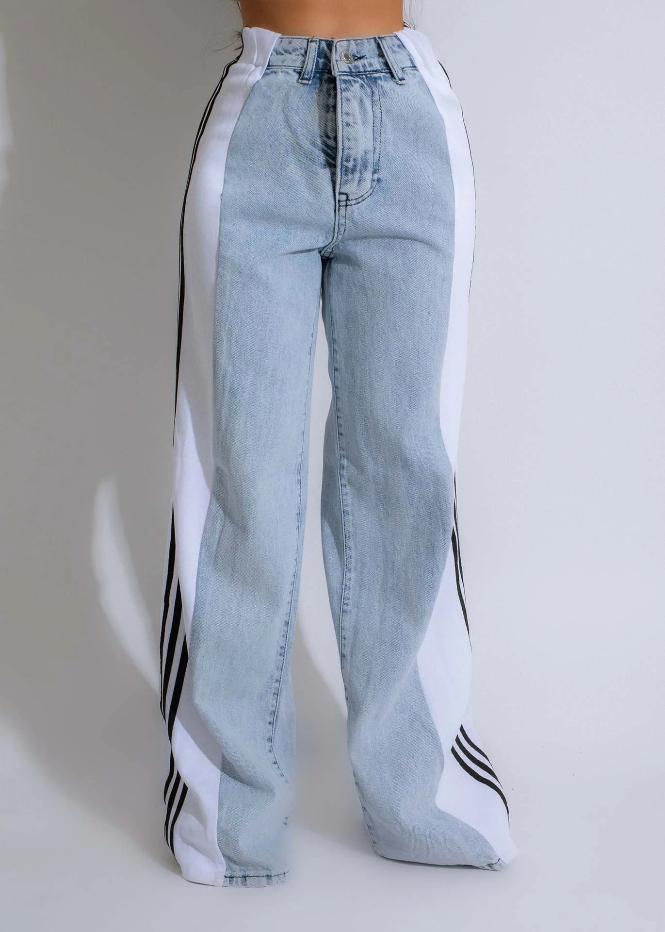 Stylish denim pants with three-stripe patchwork design in various color options