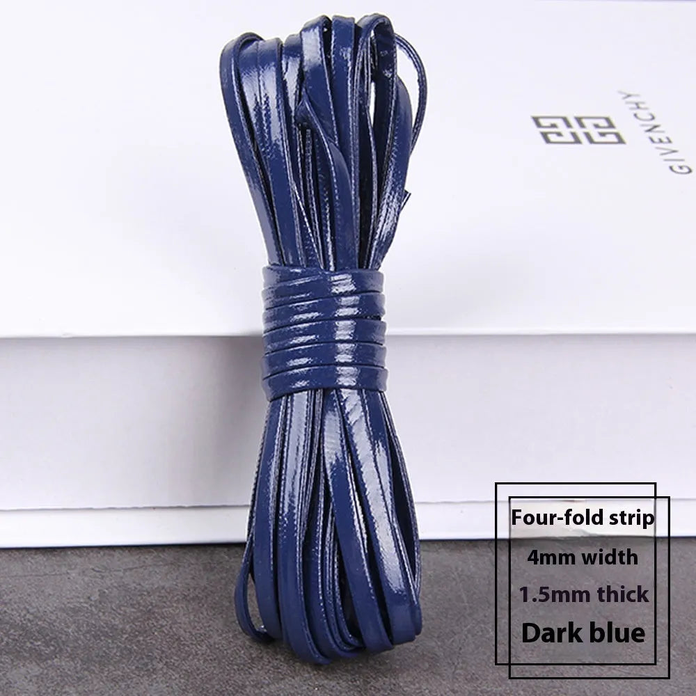 Coiled reels of PU leather craft string in multiple colours including beige, black, red, and blue.