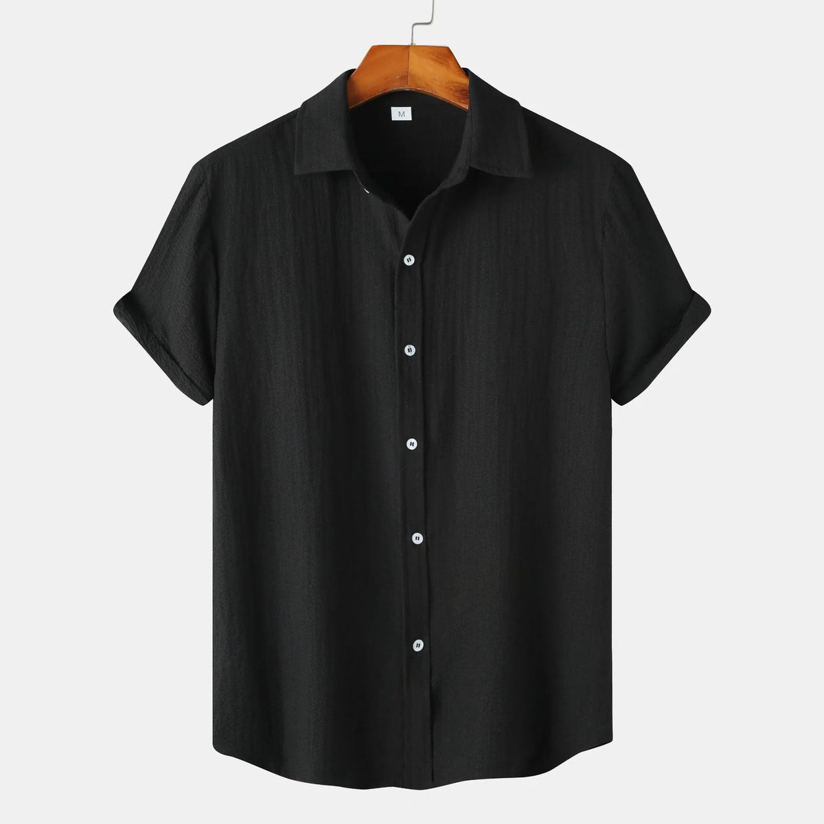 Men's casual short-sleeved cardigan shirt in polyester fabric showing colour options and relaxed fit