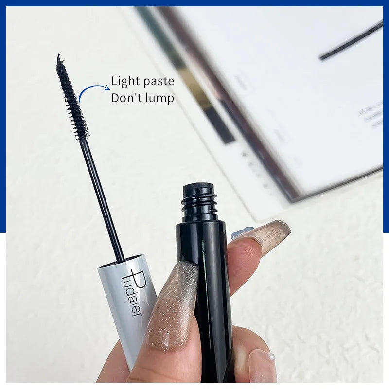 Black waterproof mascara tube with applicator showing curled lash effect