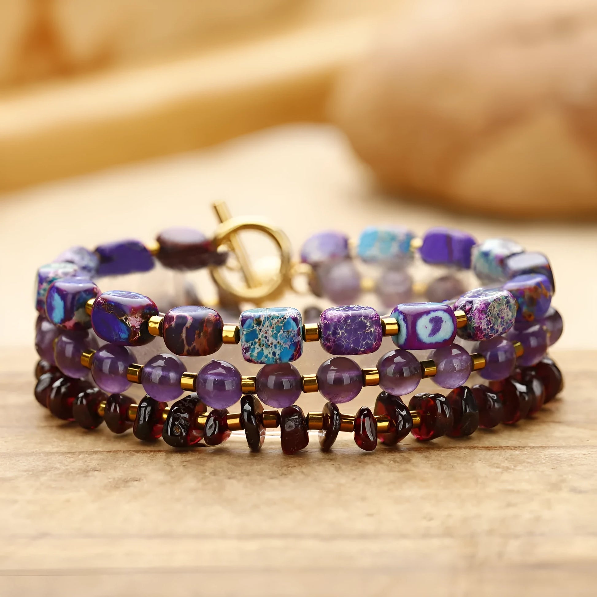 Purple amethyst and garnet stone bracelet with geometric design and adjustable sizing