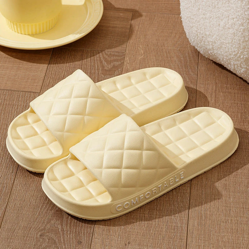 Stylish plaid slippers with soft, cushioned soles for comfortable indoor wear