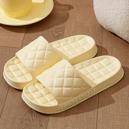 Stylish plaid slippers with soft, cushioned soles for comfortable indoor wear