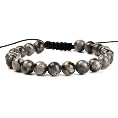Women's flat knot braided healing bracelet hand-woven with natural gemstone beads in geometric pattern