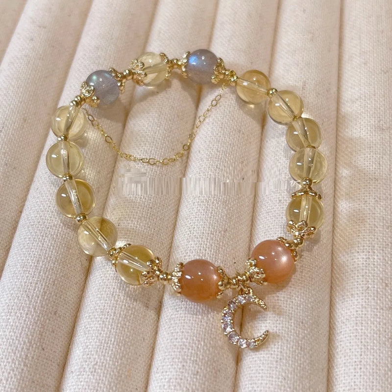 Crystal bracelet for women with 14K gold electroplated gilded finish featuring moonstone and sunstone in a Chinese style diamond cut design for fortune and spiritual wear, citrine colour option