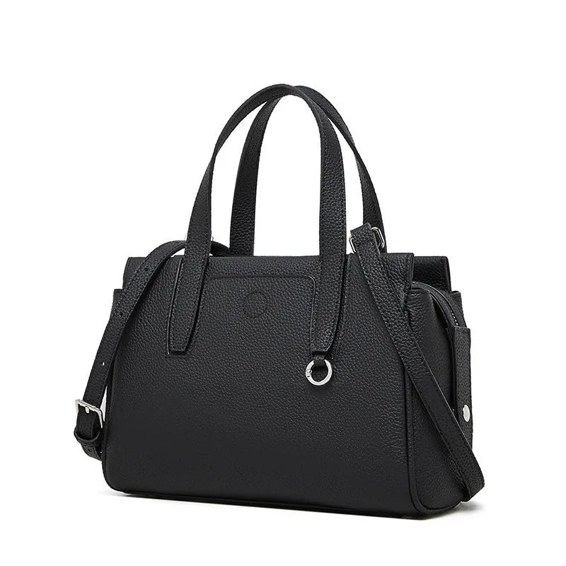 Genuine cowhide leather crossbody bag in a horizontal square shape with a single strap.