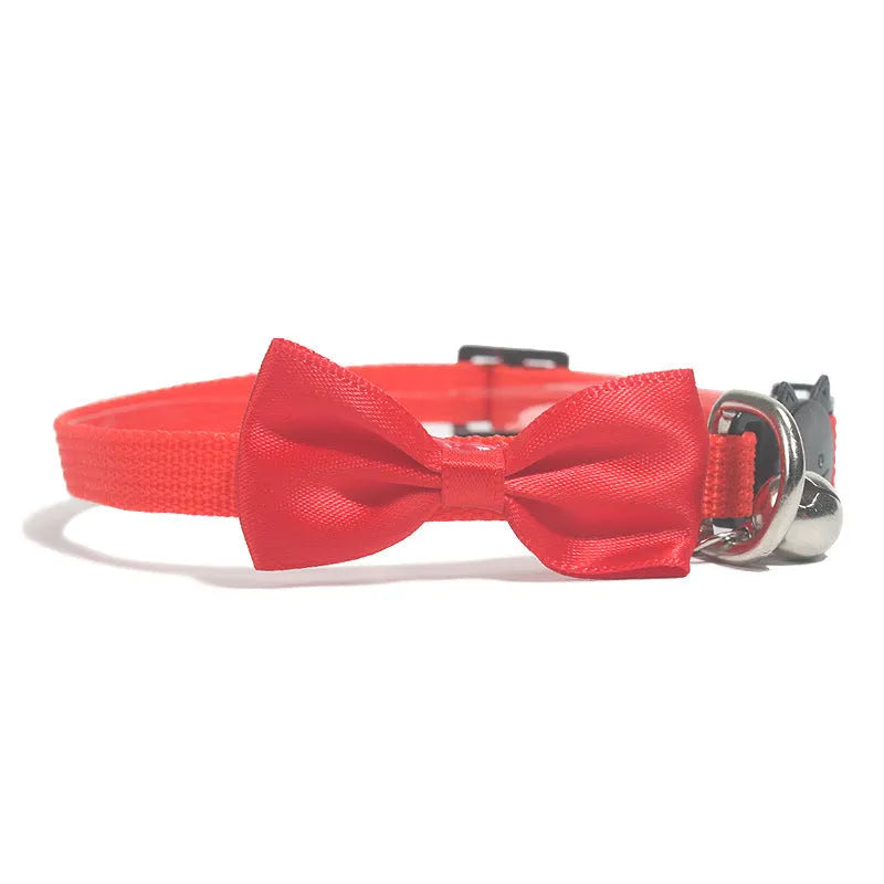 Adjustable nylon cat collar with bell decoration in striped pattern, multiple colour options available
