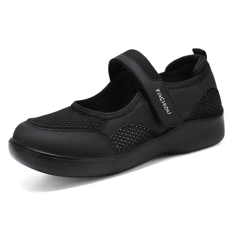 Women's breathable mesh casual shoes in black with Velcro closure and round toe design