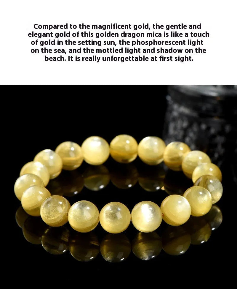 Yellow golden dragon mica round beads bracelet with polished geometric beads on a string.