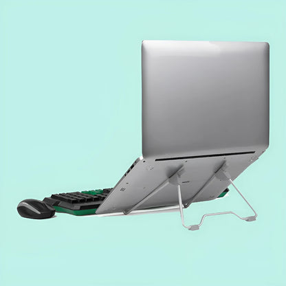Grey aluminium and plastic adjustable stand holding a mobile phone on a wooden desk.