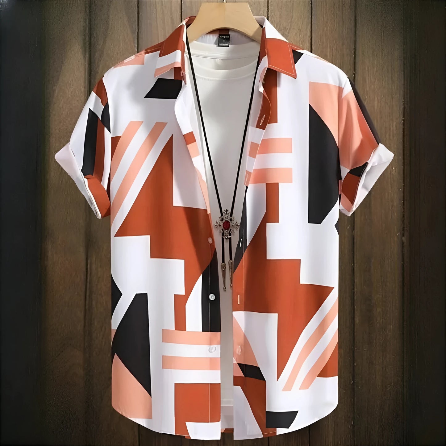 Man wearing a loose fit grey camo print short sleeve T-shirt with 3D digital detailing.