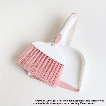 Small plastic handheld dustpan and brush cleaning kit in assorted colours.