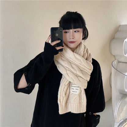 Soft, velvety Apricot Scarf with elegant patterns, perfect for keeping warm during the British winter