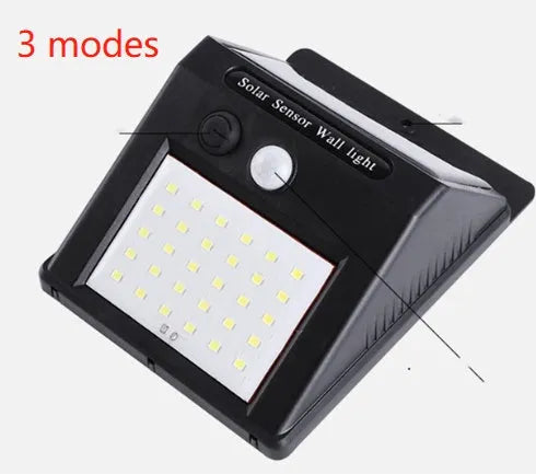 Solar-powered outdoor garden lamp with motion sensor mounted on wooden post