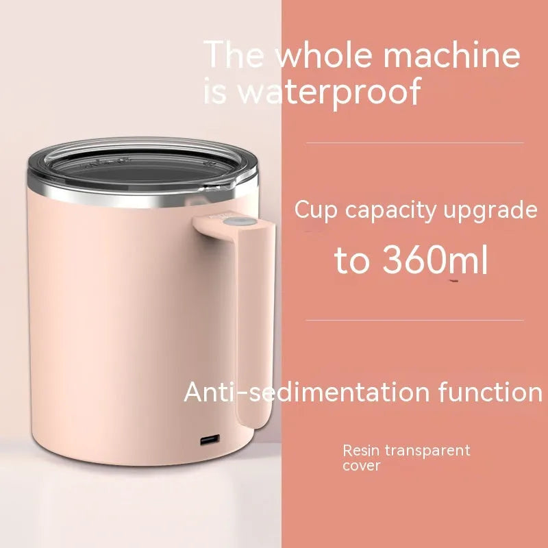 White automatic stirring coffee cup with magnetic base on a wooden table, showing simple solid-colour design.