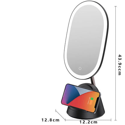 White desk lamp with integrated rectangular makeup mirror and UK plug on a wooden table.