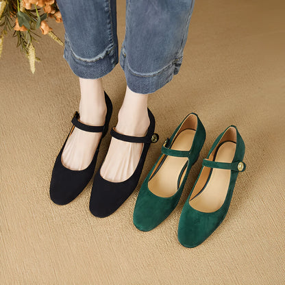 Women's dark green suede Mary Jane shoes with a chunky heel and square toe.