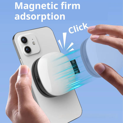 Black and white mini mobile phone fill light with magnetic holder attached to a smartphone