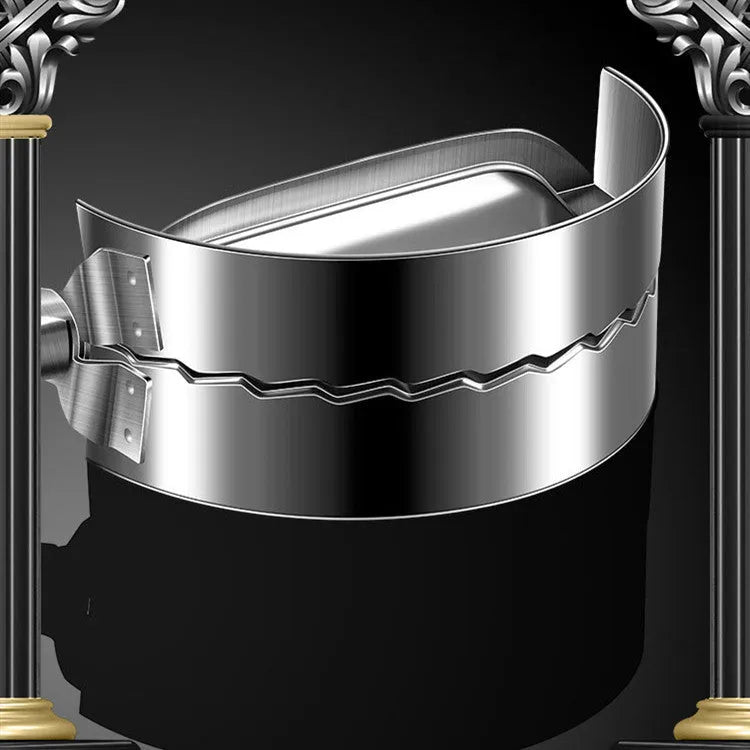 Silver stainless steel manual dumpling press with hinged handles on a wooden kitchen surface.