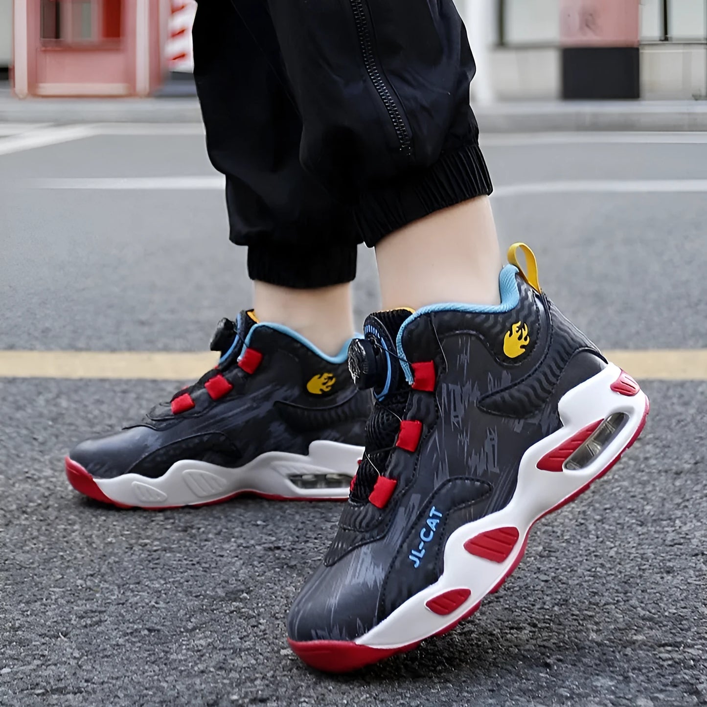 Cushion basketball running shoes with rotating button closure in black synthetic leather