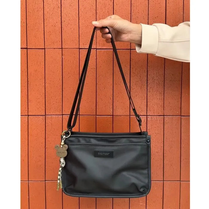 Small square Oxford cloth crossbody bag in trendy cool colour for leisure travel
