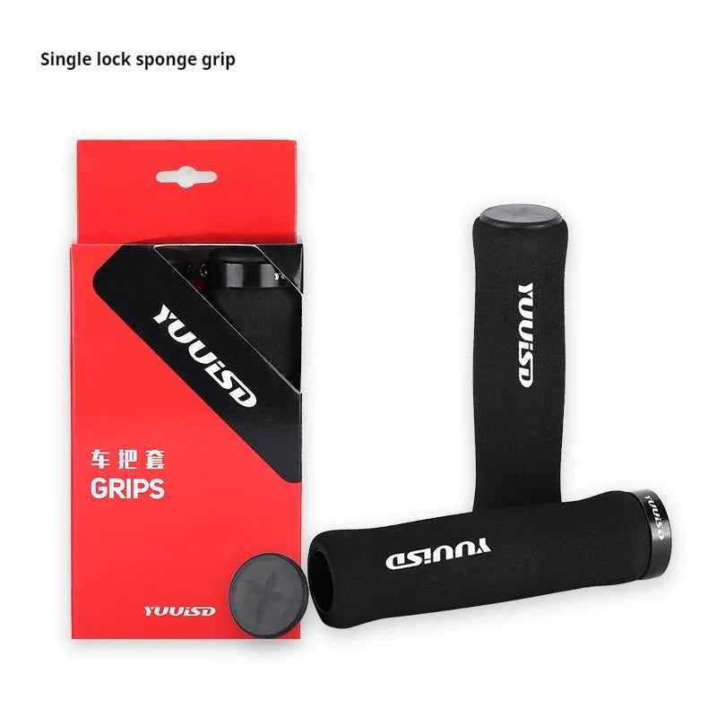 Mountain bike handle cover in soft sponge material with shock absorber design