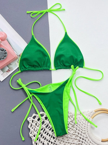Women's black bikini swimsuit with chest pads and brief style panties
