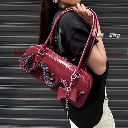 Red PU bowling bag with soft carry handle, sewing line detail, and single shoulder strap in new Chinese style.