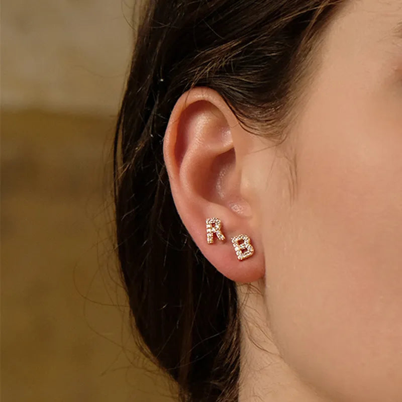 Brass gold plated alphabet letter earrings with zircon accents showing A-Z character options