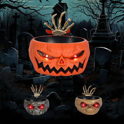 Motion-activated Halloween pumpkin candy bowl with lighted red eyes and skeleton hand in grey colour