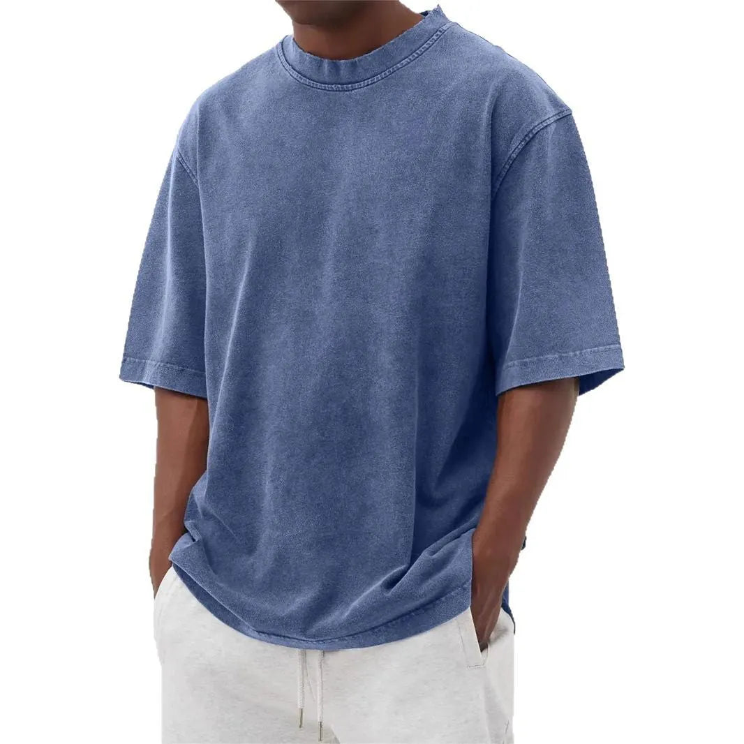 Men's loose fit stone-washed distressed short sleeve t-shirt in solid colour