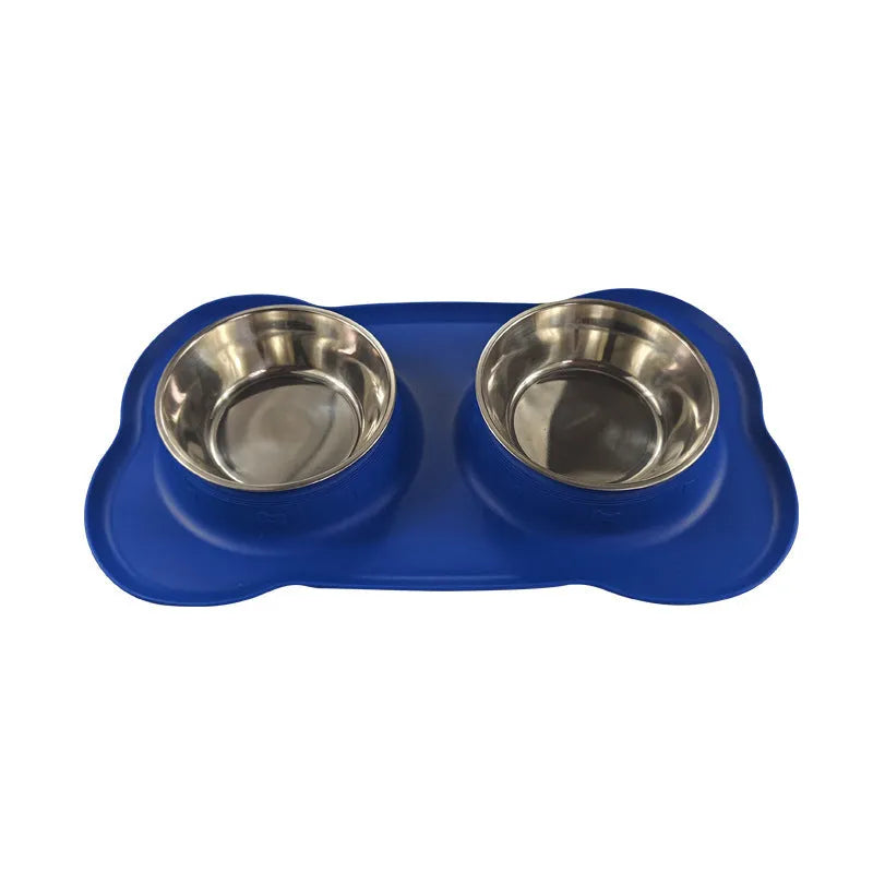 Large silicone dog bowl with stainless steel insert in five colour options on kitchen floor