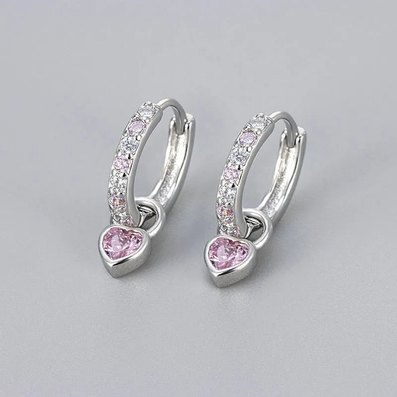 Women's fashion earrings with heart-shaped eardrops, diamond-treated gemstones in gold or white gold plating, approximately 2.5 cm long