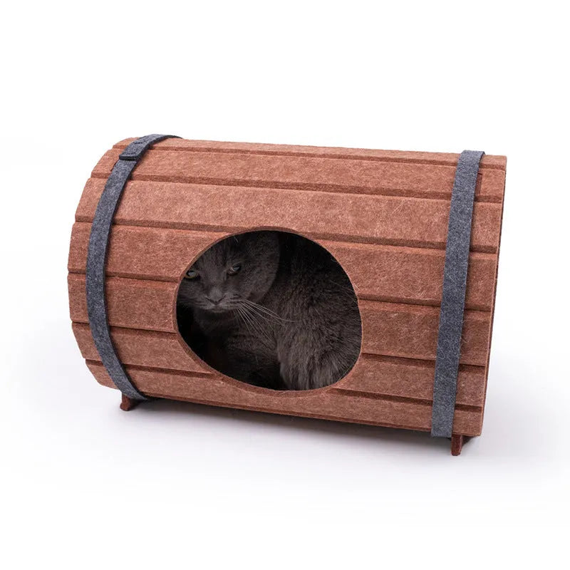 Assembled wine barrel shaped cat bed made from grey polyester felt board.