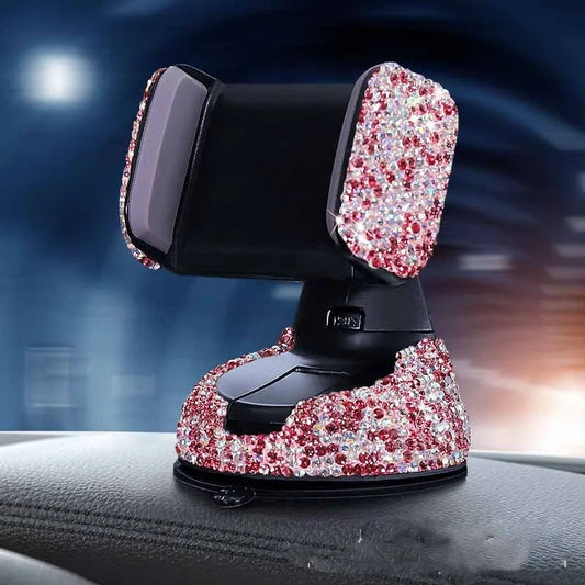 Diamond-encrusted car phone holder mounted on air vent with smartphone securely attached