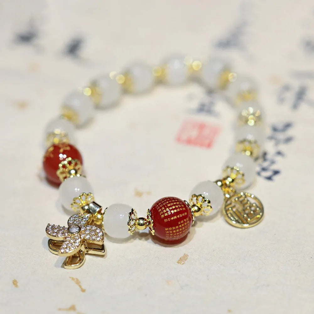 Women's Chinese-style glass bracelet with safety lock charm in choice of three colour options