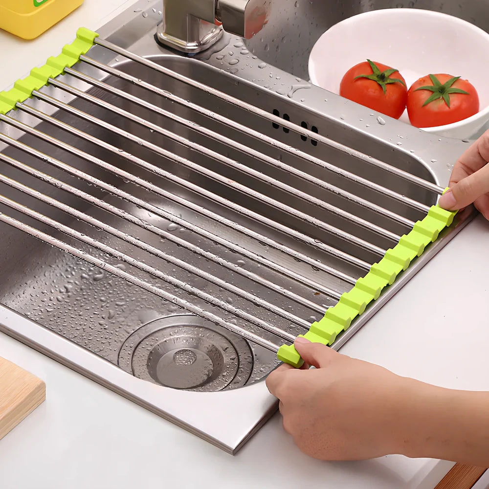 Stainless steel sink drain rack with rolling curtain design folded to show compact 5cm storage thickness