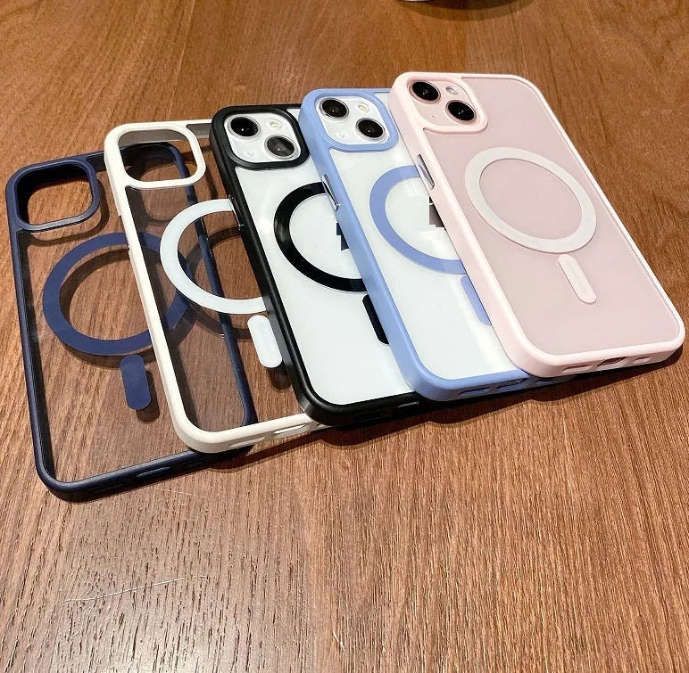 Clear acrylic MagSafe phone case for iPhone showing magnetic ring, displayed in pink, blue, white, black, and navy blue colour options.