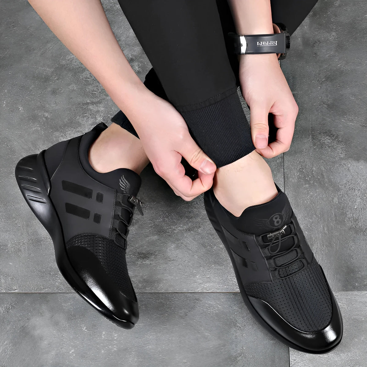 Men's black casual sneakers with a hidden internal heel lift, available in leather, Lycra and mesh upper options.