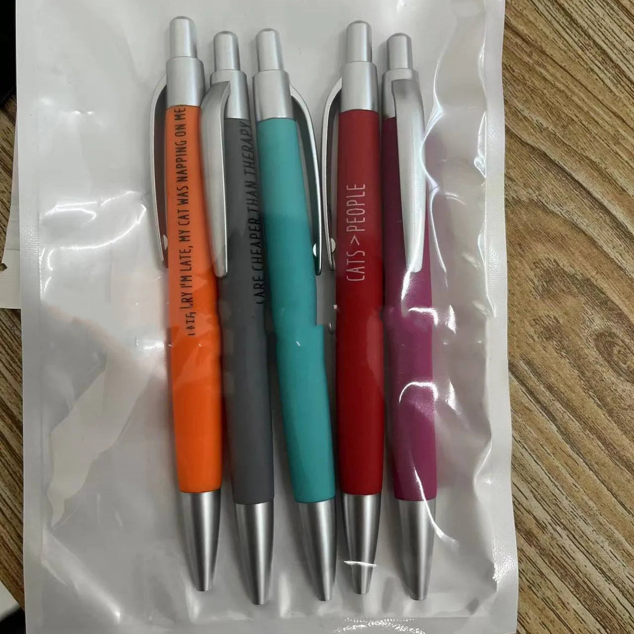 Coloured automatic pen marker set with push action mechanism and animal-themed designs