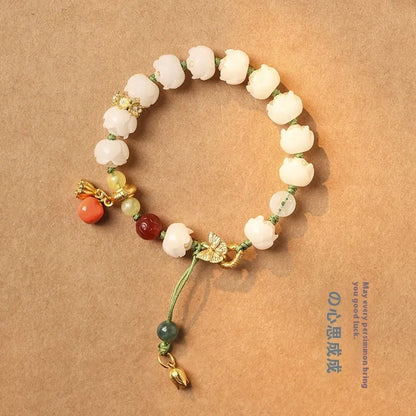 White jade Bodhi bracelet with lotus and pumpkin beads on open rope design